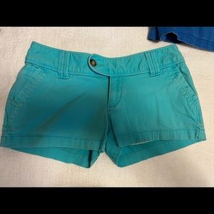 Red camel shorts, turquoise